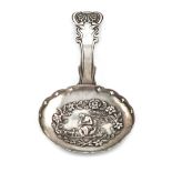 A George III silver caddy spoon, by John Bettridge, Birmingham 1817, the oval bowl embossed with a