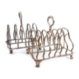 Two similar William IV silver seven and five bar toast racks, by Paul Storr, London 1836, shaped