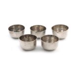 A rare set of five late 17th century miniature silver toy tea bowls, maker's mark of I.F with a star