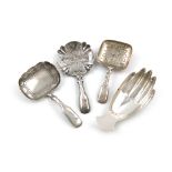 A small collection of four silver caddy spoons, comprising: one modelled as a hand, by F. Howden,