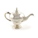 λA George II Scottish silver teapot, by Edward Lothian, assay master Hugh Gordon, Edinburgh 1749,