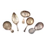 A collection of five antique silver caddy spoons, various dates and makers, including: a George