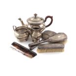 λA mixed lot, comprising a three-piece silver tea set, by the Adie Brothers, Birmingham 1913,