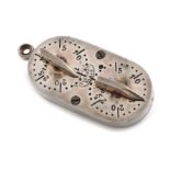 A French electroplated game counter, by Penot, Paris, circa 1900, oblong form, with four dials for