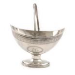 A George III provincial silver swing-handled sugar basket, by Hampston and Prince, York 1790, also