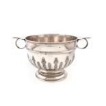 A late-Victorian silver two-handled punch bowl, by Gibson and Langman, London 1897, circular form,