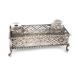 A George III silver inkwell, by Samuel Herbert & Co, London 1765, rectangular form, the gallery