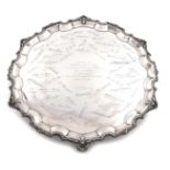 A large silver salver, by Mappin and Webb, Sheffield 1941, circular form, beaded and shell border,