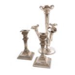 A pair of Edwardian silver candlesticks, by Frederick Highland, London 1905, tapering square form,