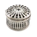 A George III pierced silver bougie box, by Richard Glanville, London 1777, circular form, pierced