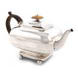 λA George III provincial silver teapot, by Barber and Whitwell, York 1815, rounded rectangular form,