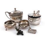 A mixed lot of silver items, comprising: two George III mustard pots, makers marks worn, London 1803