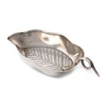 A George III silver caddy spoon, by Joseph Willmore, Birmingham 1805, deep leaf form, engraved