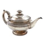 λA George IV silver teapot, by Richard Atkins & William Somersall, London 1825, circular bellied