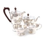 A four-piece silver tea set, by Collingwood & Sons Ltd., Birmingham 1915, circular form, scroll