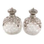 A pair of Victorian silver-mounted cut-glass scent bottles, by J. Rosenthal, London 1892, globular