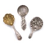 A small mixed lot of three antique silver caddy spoons, comprising: a Victorian one by Foxall &