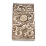 A Chinese silver visiting card case, rectangular form, pull-off cover, the front embossed with a