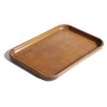 A VICTORIAN OAK TRAY THIRD QUARTER 19TH CENTURY with a moulded gallery 52.2 x 74.5cm