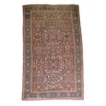 A LARGE ZIEGLER MAHAL CARPET NORTH WEST PERSIA, LATE 19TH CENTURY with a madder red field and an all