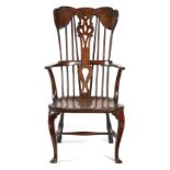 A RARE GEORGE III CHERRY AND ELM WINDSOR ARMCHAIR THAMES VALLEY, C.1770 the wing back with an