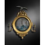 A RARE REGENCY CONVEX WALL MIRROR ATTRIBUTED TO THOMAS FENTHAM, C.1810 with a Chinese reverse