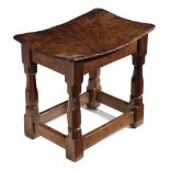 A MOUSEMAN OAK JOINT STOOL BY ROBERT 'MOUSEMAN' THOMPSON (1876-1955), C.1930-40 with a burr oak