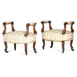 λ A PAIR OF 19TH CENTURY FRENCH ROSEWOOD WINDOW SEATS C.1840-50 each with moulded arm supports, with