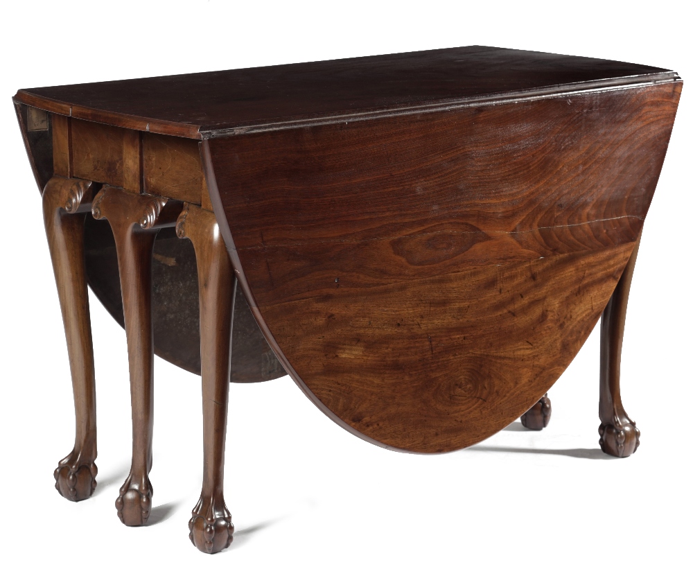 A MAHOGANY DINING TABLE IN GEORGE II IRISH STYLE 18TH CENTURY ELEMENTS AND LATER the oval drop-