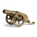 A SMALL BRASS DESK MODEL OF A SIGNAL CANNON PROBABLY LATE 19TH / EARLY 20TH CENTURY mounted on a