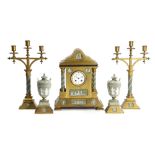 A GILT BRASS AND WEDGWOOD POTTERY MOUNTED CLOCK GARNITURE C.1870-80 the French brass drum eight