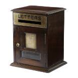 AN EDWARDIAN MAHOGANY COUNTRY HOUSE LETTER BOX EARLY 20TH CENTURY with a brass panel, inscribed '