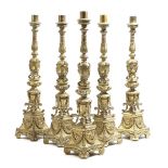 A SET OF FIVE ITALIAN GILT BRONZE ALTAR STYLE CANDLESTICKS VENETIAN, LATE 18TH / EARLY 19TH