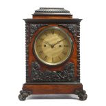 λ A SMALL WILLIAM IV ROSEWOOD AND PATINATED BRONZE BRACKET CLOCK BY FRODSHAM & BAKER, C.1830-35