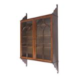 A REGENCY MAHOGANY HANGING DISPLAY CABINET C.1810 with a pair of lancet astragal glazed doors