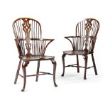 A NEAR PAIR OF GEORGE III YEW AND ELM WINDSOR ARMCHAIRS C.1770-80 each with a hoop stick back