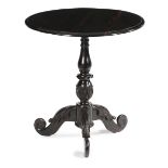 AN ANGLO-CEYLONESE EBONY TRIPOD OCCASIONAL TABLE MID-19TH CENTURY the circular fixed top with a