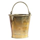 A BRASS BUCKET OR PAIL EARLY 19TH CENTURY of tapering form, with reeded bands and a swing handle