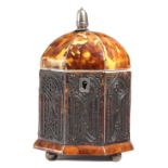 λ A GEORGE IV TORTOISESHELL OCTAGONAL TEA CADDY C.1820-25 the hinged domed lid inlaid with pewter
