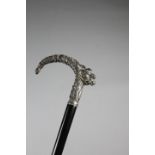 A CHINESE WALKING CANE C.1880 the silver handle in the form of a scaly dragon, with a vacant plaque,
