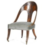 A REGENCY BEECH AND MAHOGANY KLISMOS SLIPPER CHAIR POSSIBLY IRISH, C.1810 with applied fret