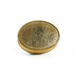 A HORN OVAL PARCEL GILT SNUFF BOX EARLY 18TH CENTURY engraved with Britannia with war trophies,