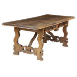 AN ITALIAN BAROQUE WALNUT REFECTORY TABLE PROBABLY 17TH / 18TH CENTURY the boarded top above a