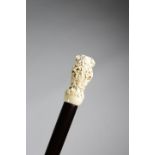 λ AN INDIAN IVORY KRIS HANDLE WALKING CANE MID-19TH CENTURY AND LATER finely carved with a bird's