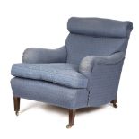 A LATE VICTORIAN EASY ARMCHAIR BY HOWARD & SONS, C.1900 on walnut square tapering front legs and