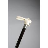 λ AN EDWARDIAN IVORY HANDLED WALKING CANE C.1900 in the form of the White Rabbit from Alice in