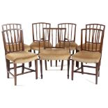 A SET OF SIX GEORGE III MAHOGANY DINING CHAIRS IN SHERATON STYLE C.1800 each with a bar back, with