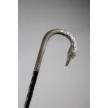 A DRESS WALKING CANE C.1920 the silver shepherd's crook handle with a bird's head terminal, with