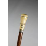 λ A VERY RARE IVORY AND PIQUE WORK HANDLED SWORD STICK EARLY 18TH CENTURY with a pull-out steel