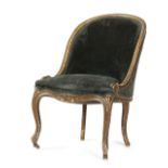 AN EARLY VICTORIAN GILTWOOD SLIPPER CHAIR C.1840-50 upholstered with green velvet, the moulded frame